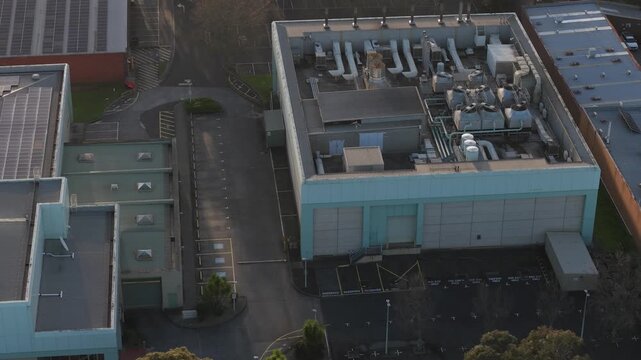 Melbourne, VIC, Australia - 03 September 2026: Aerial view of Knox Data Centre showing rooftop cooling units and industrial infrastructure.