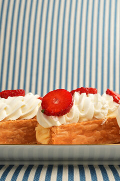 Mini Strawberry Millefeuille Pastries on Decorative Tray Close Up