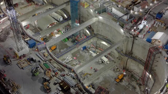 London, England - 21 March 2026: Aerial view of the HS2 Victoria Road Crossover Box construction site with deep excavation and heavy machinery.