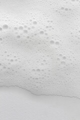 Abstract background white soapy foam texture. Shampoo foam with bubbles