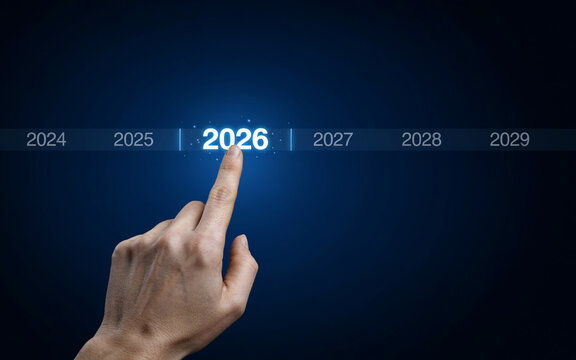 Hand touching holographic timeline interface focusing on year twenty twenty six date.