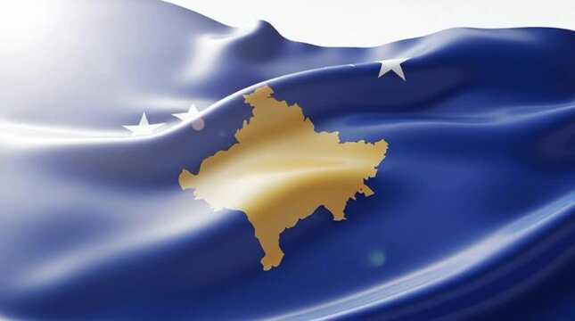 Close-up view of the national flag of Kosovo waving in the wind, featuring its blue field, golden map, and six white stars.