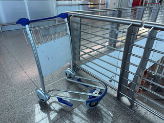 luggage cart at airport terminal, travel concept, transport, airport, travel © Volha