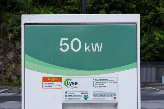 August 16, 2026, Sauda, Norway - Electric vehicle charging station displaying 50 kW power and payment instructions