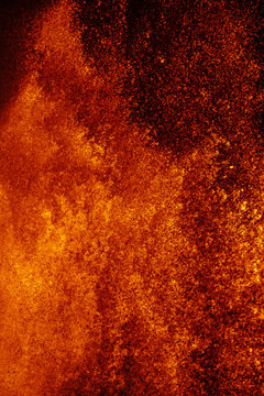 View of molten lava erupting from Kilauea Crater, displaying glowing textures and intense heat in Hawaii County, Hawaii, United States.