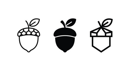 Three acorn silhouettes with leaves a black and white vector illustration © Jahanur