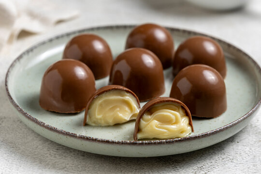 Milk Chocolate Truffles and Bonbons with Creamy White Filling