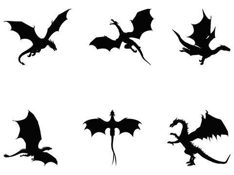 Black silhouette dragons flying in different poses