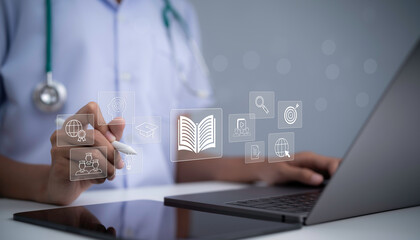 Fototapeta na wymiar Doctor using digital learning technology with laptop showing education icons open book research training knowledge healthcare professional development online medical education and virtual learning