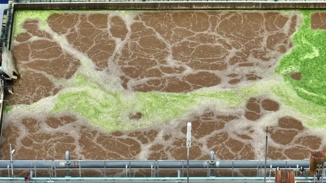 Drone view captures active wastewater treatment inside an industrial facility, reflecting water purification, pollution prevention, environmental compliance and sustainable industrial development.
