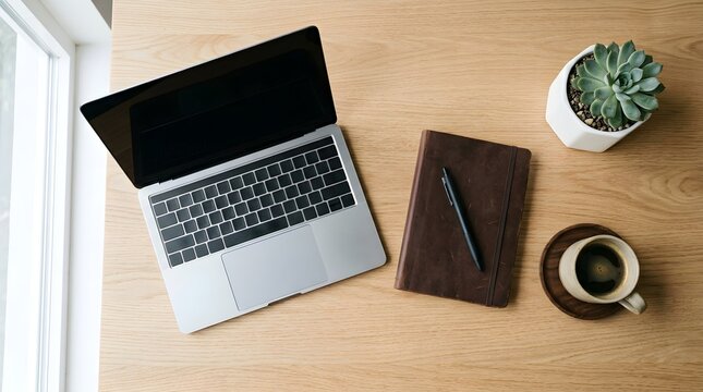 Natural Overhead View Of Laptop And Workstation Setup