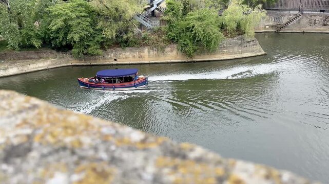 Narrowboat Cruising Along the River Avon in Bath