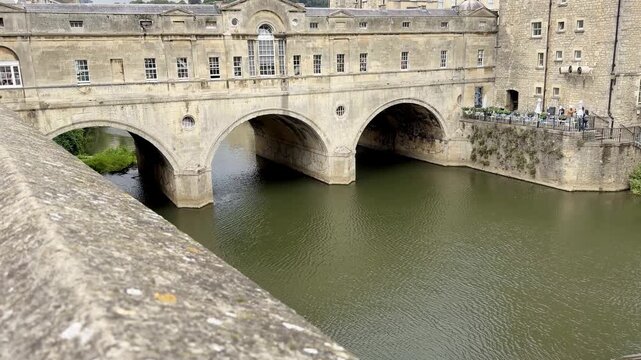 Arches of a Historic Stone Bridge Over the River Avon