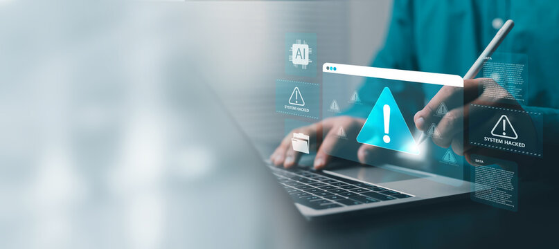 AI cybersecurity warning on a laptop showing a system hacked alert, digital threat detection, data breach, network security, malware protection, and technology risk management.