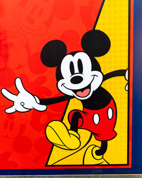 Bangkok, Thailand - September 4, 2026 : Black and white Mickey Mouse out of wallpaper backdrop on a yellow and red background.