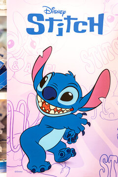 Bangkok, Thailand - July 1, 2025 : A cute blue lilo stitch wallpaper display at the cinema to promote the movie, attracting attention from eager movie fans