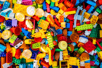 Top view A pile of multicolor of many Lego toy blocks in various shapes and different sizes. Toys and games. Leisure and recreation. © funfunphoto