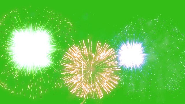 Animation of green fireworks exploding on white background. new year's eve tradition and celebration concept digitally generated video.
