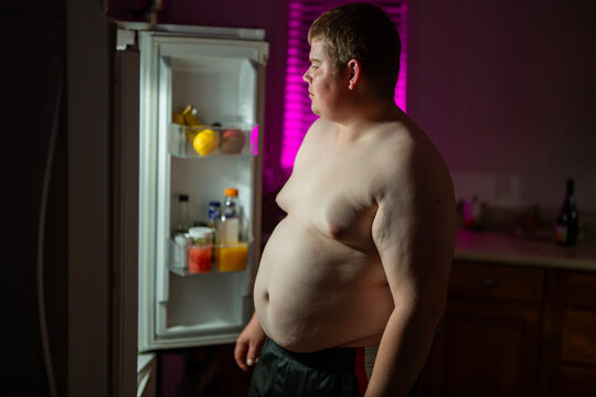 Health concept shows lifestyle imbalance. Late night health risk increases. Man ignores health warning signs. Health relates to obesity disease.