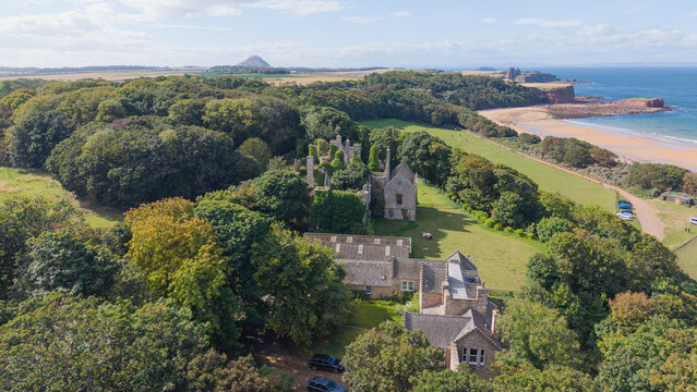 Aerial view of historic Seacliff House ruins near Seacliff Beach North Berwick Scotland
