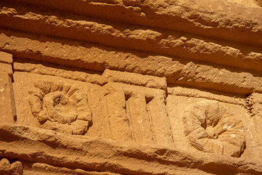 Rosette carving on a Nabataean tomb facade at Hegra, Al Madinah Province, Alula, Saudi Arabia