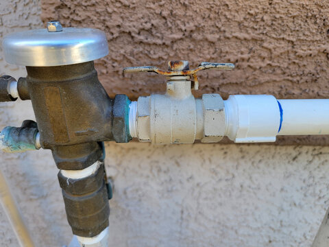 Backflow valve together with brass ball valve of irrigation system connecting pipes