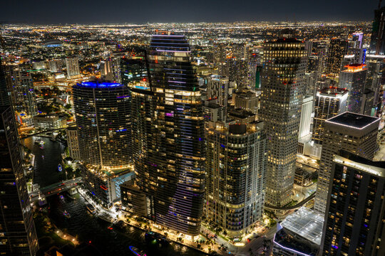 Mega aerial photo Downtown Miami on the river lit at midnight