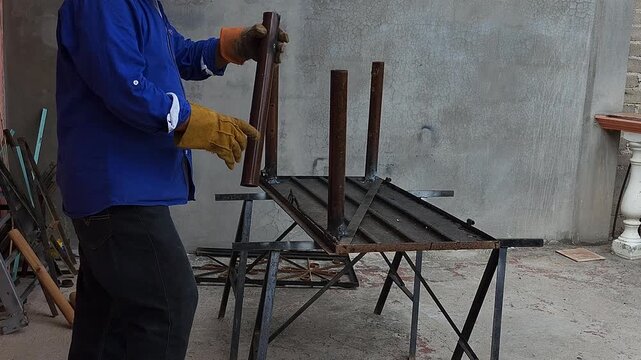 Placing a metal pipe to assemble a leg for a rustic table frame
