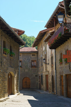 Charming traditional Spanish village with stone architecture and terracotta roofs