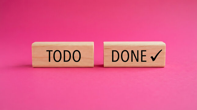 Two wooden blocks labeled todo and done with a checkmark symbol on a pink background, representing task management, productivity, goal completion, project tracking, and organizational efficiency