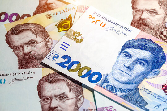 Ukrainian hryvnia banknotes featuring a 2000 hryvnia banknote with Vasyl Stus over 1000 hryvnia bills with Volodymyr Vernadsky. Money of Ukraine.