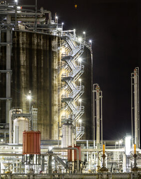 Canada, BC, Delta.  Liquified natural gas storage facility at night, Tilbury Industrial Park.