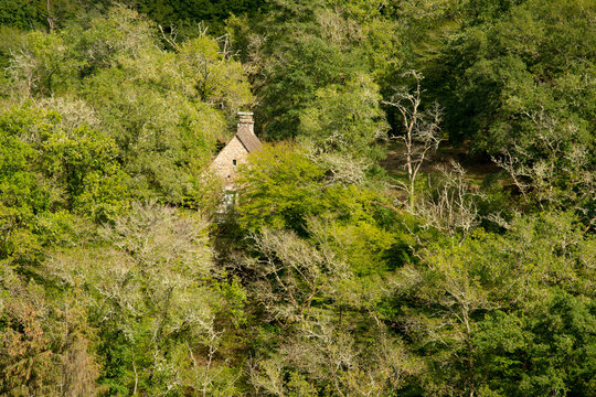 Small stone house tucked in the forest  above the Maronne river in Saint-Geniez-&ocirc;-Merle, Corr&egrave;ze, France