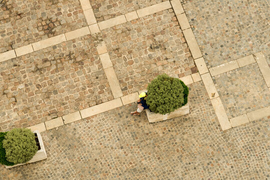 France, Bordeaux, St Emilion.  Overhead view of square below the Monolithic Church tower.