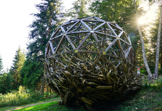 "La Frau" sphere under filtering golden light, Lavarone, Trentino, Italy