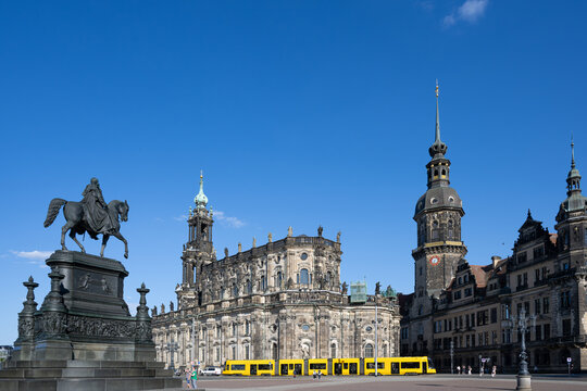 Dresden Cathedral on Theaterplatz Saxony, Germany and a yellow tram