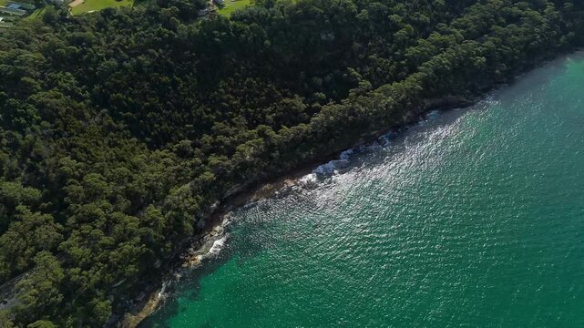 Overhead drone footage of the picturesque coastline at Chowder Bay, Sydney Harbour, NSW, Australia