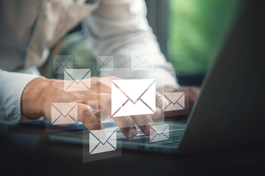 Digital Message Management Concept Featuring Multiple Floating Email Graphics.
