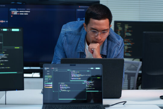 Programmer Developing Software with Artificial Intelligence Code
