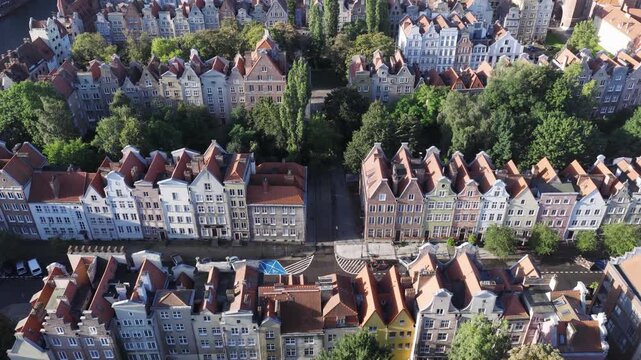 Aerial view of historic gabled buildings with red tiled roofs in the old town of Gdansk, Pomeranian Voivodeship, Poland.