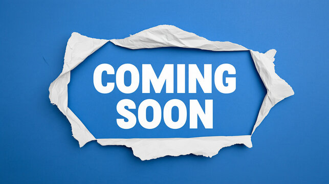 Coming soon text revealed through a torn white paper hole on blue background. Great for product launch announcement and promotion banner concepts.