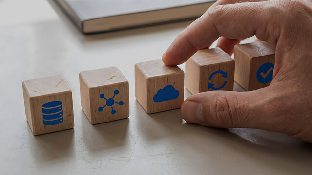Conceptual Photo of Enterprise Cloud Data Migration DevOps CI CD Pipeline and Cloud Infrastructure Integration on Wooden Blocks