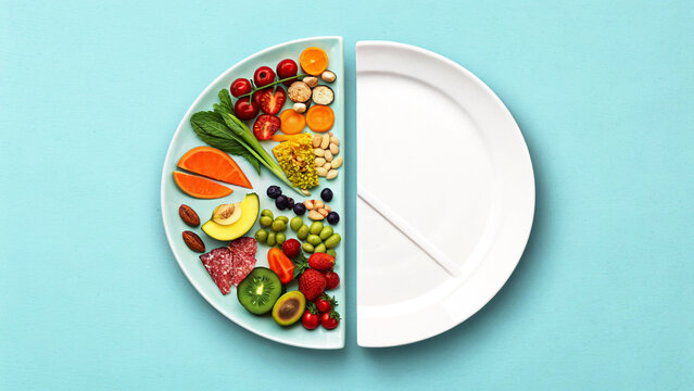 Divided plate filled with colorful fresh vegetables