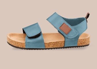 Obraz premium Blue cork footbed sandal isolated on beige background