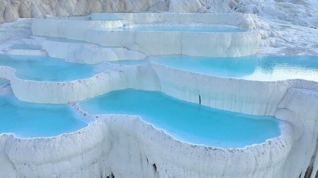 An aerial view of the Pamukkale Travertines. Pamukkale Travertines Drone Video, Pamukkale Denizli, Turkiye (Turkey)	