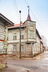Historic wooden corner house features a prominent architectural turret in Viljandi, Estonia © venemama