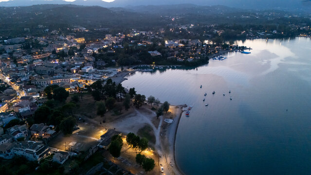 Aerial view Corfu marina and coastal town at night