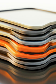 A pile of cell phones stacked on top of each other. vertical frame