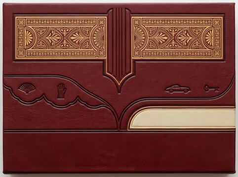 Burgundy leather folio with ornate gold embossed cover design