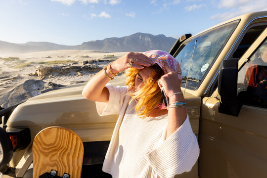 young woman with wind blown hair, Sopies Klip, Walker Bay Nature Reserve, Stanford, South Africa